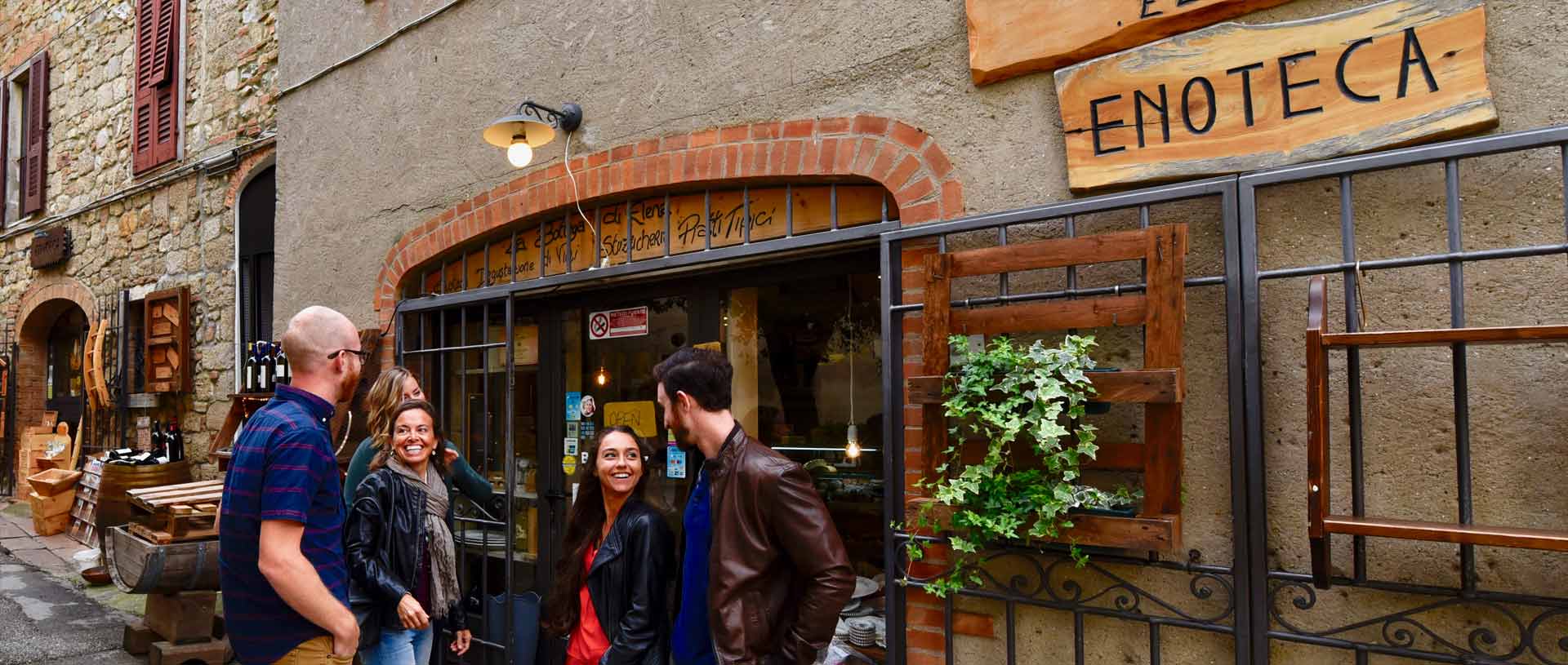 Tuscan food and wine tours Food and wine tours gusts in front of tuscan restaurant