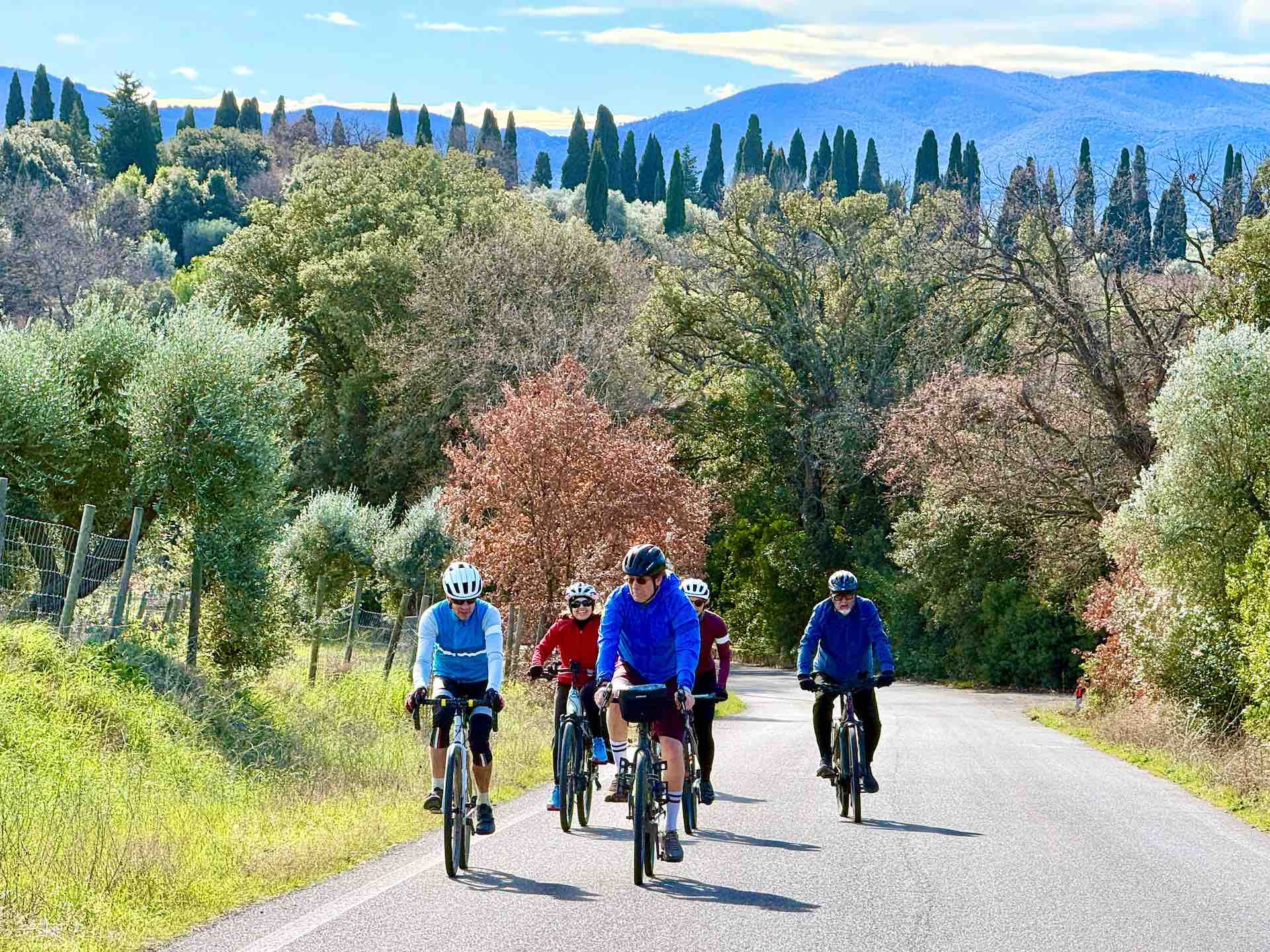 Cycling in Tuscany during winter with friends and scenic countryside views